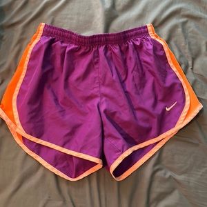 Orange and purple Nike shorts
